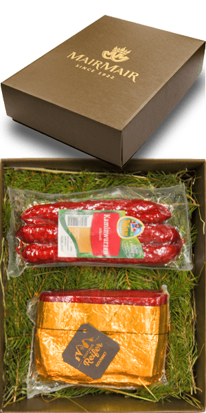 Confezione Regalo Specialità affumicate tirolesi Speck Oro Magro + Affumelli Kaminwurzen - 630 g Confezione Regalo Specialità affumicate tirolesi Speck Oro Magro + Affumelli Kaminwurzen - 630 g