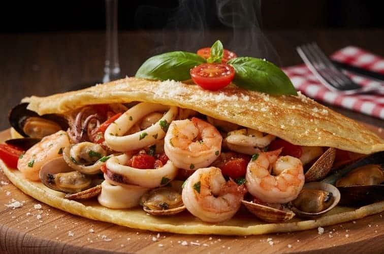 Crespelle italienische Art in einer Variante mit Meeresfruechten